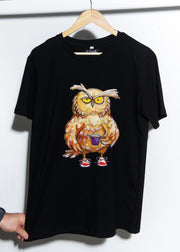 A black short-sleeved men's t-shirt featuring a printed owl on the front, displayed on a wooden hanger against a white background.